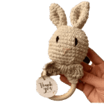 Wooden teething toy with a bell